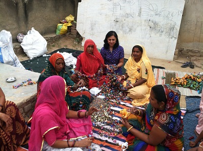 women sitting on ground