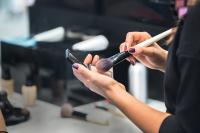 woman with makeup kit