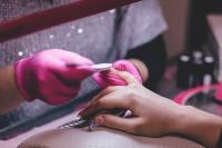 Image: person getting a manicure. Topic: The Search for a Non-Toxic Salon