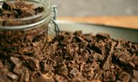 Image: jar of chocolate shavings. Topic: End child labor in cocoa.