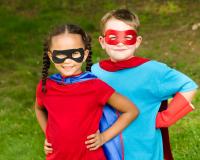 Image: two kids in costumes. Topic: Green Your Halloween: From Organic Candy to Nontoxic Face Paint