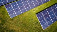 Image: overhead view of solar panels. Topic: Could the World be Powered Fully by Renewable Sources?