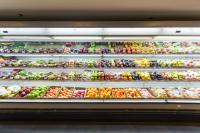 Image: refrigerator at grocery store with produce. Title: “Cool It” Campaign: Groups Take Aim at Walmart’s Massive Refrigerant Leakage Problem