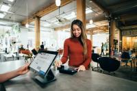 Photo of a customer at a check out counter