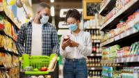 Image: couple in a supermarket. Topic: Don't Discount Our Future, Trader Joe's