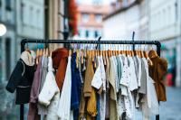 Image: children's clothing hanging. Title: Toxic Textiles Update: Carter’s First Sustainability Report