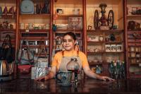 A latina woman in a shop in Lerma da Villada, Mexico. latino/a-owned