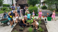 Parents and Children Planting a garden