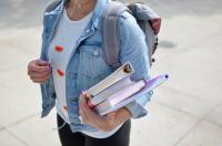 student with books