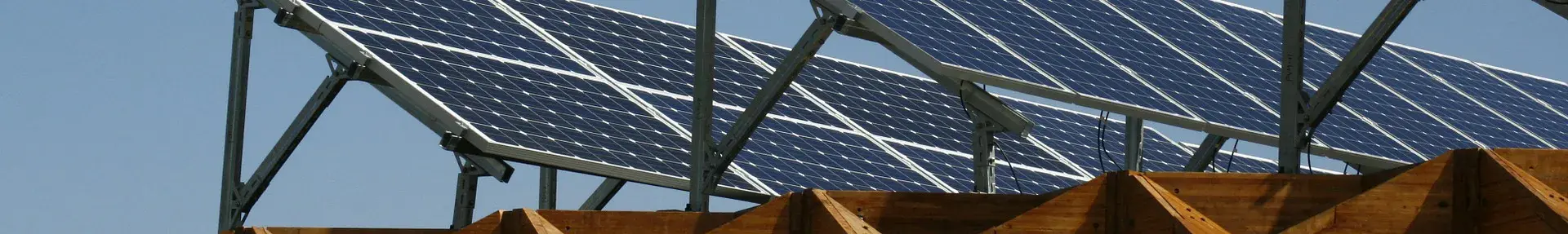 Image: solar panels against cloudless sky. Renewable Energy.