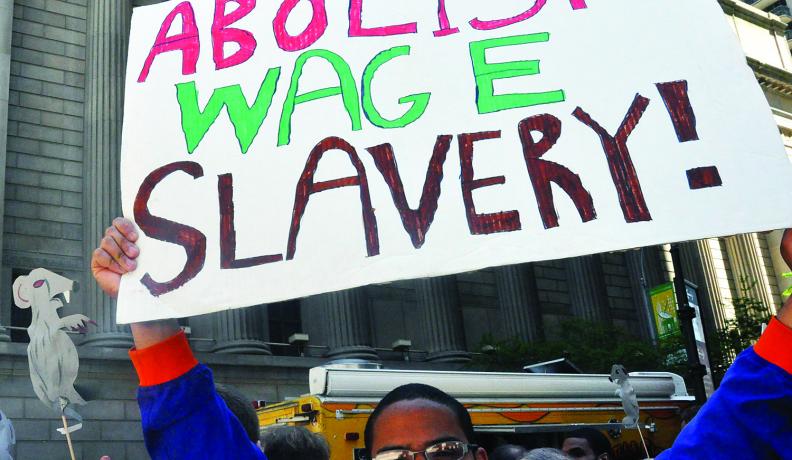 Workers marching on May day 2013 in New York city