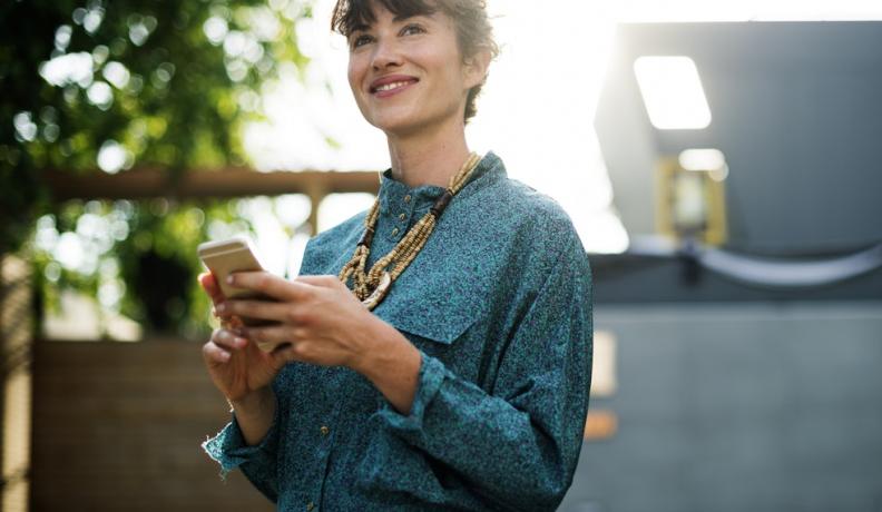 woman smiling with phone