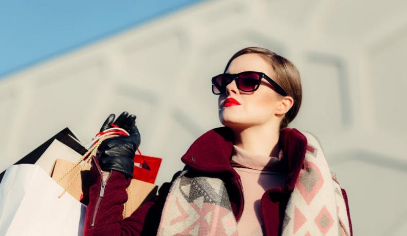 woman holding shopping bags