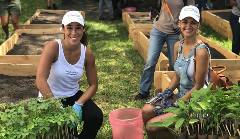 Image: two women working in a garden. Title: What is the Circular Economy?