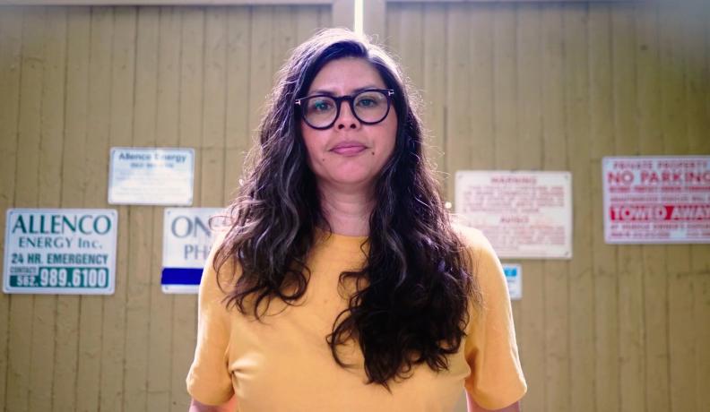 Gabriela Garcia, South LA Resident and organizer photographed outside of the AllenCo oil site in University Park, Los Angeles.