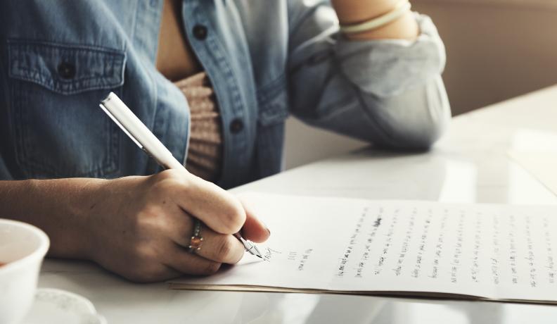 woman writing a letter