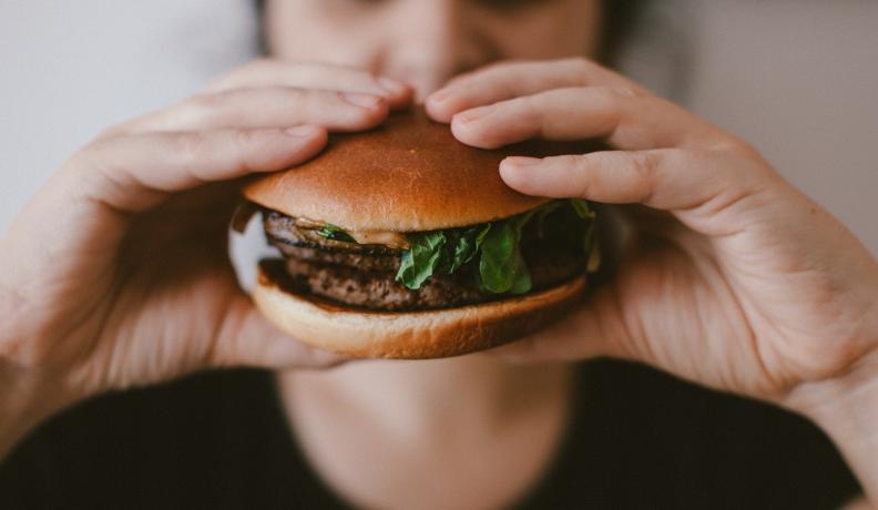 eating a burger