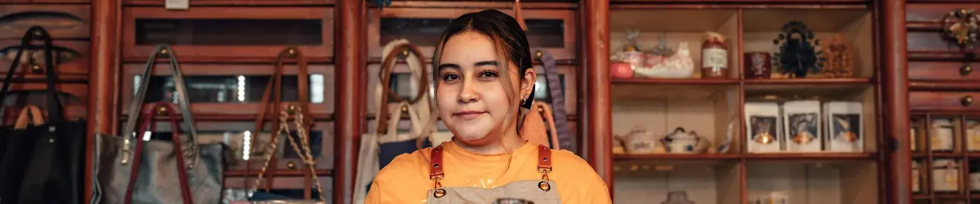 A latina woman in a shop in Lerma da Villada, Mexico. latino/a-owned