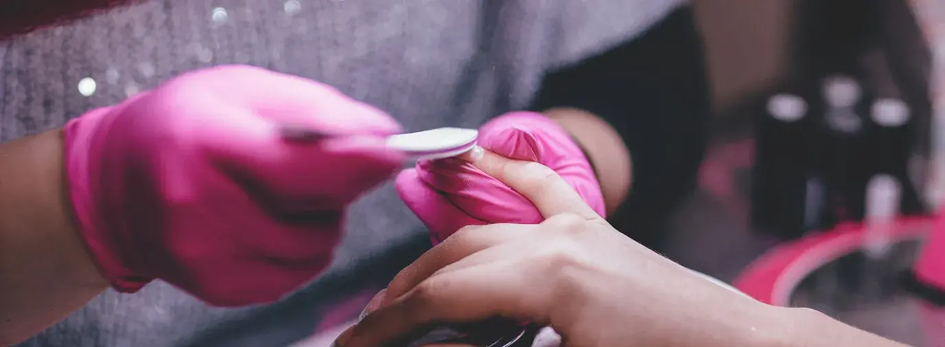 Image: person getting a manicure. Topic: The Search for a Non-Toxic Salon