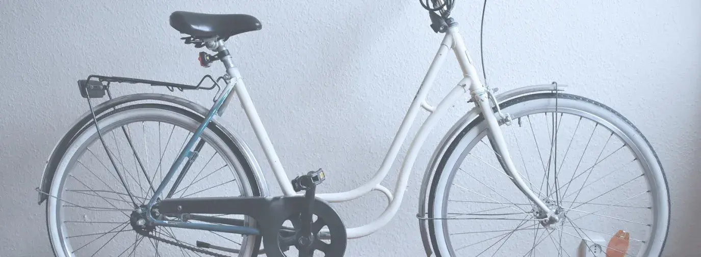 Image: electric bicycle leaned against wall