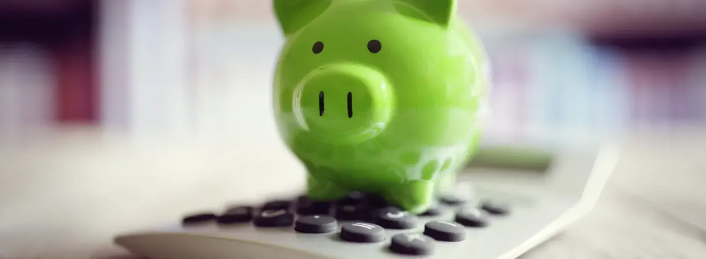 piggy bank on calculator