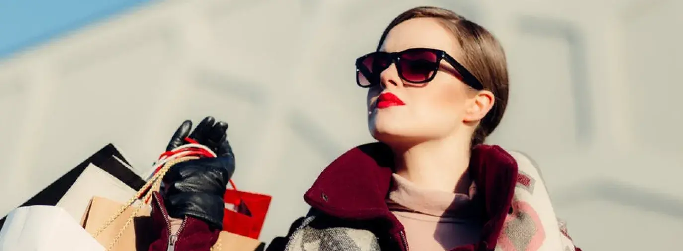 woman holding shopping bags