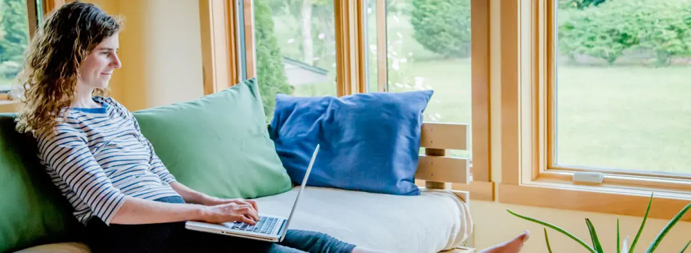 woman sitting on an eco friendly couch