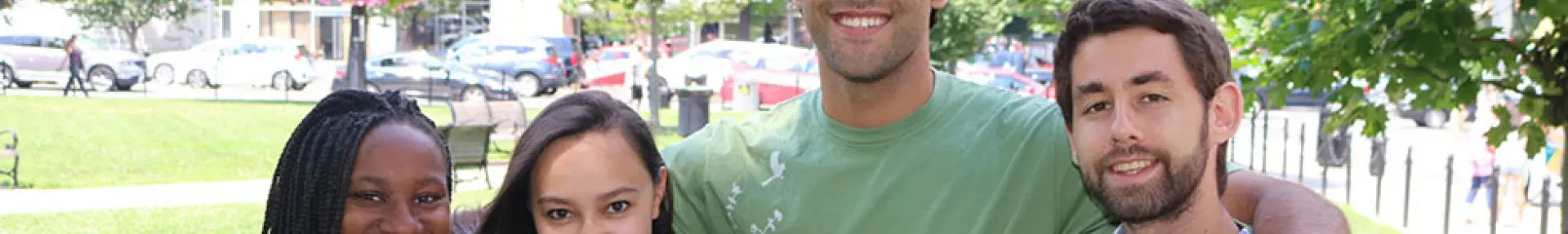 Photo: staff in "I am a Green American" T-shirts. Topic: Green America membership FAQ