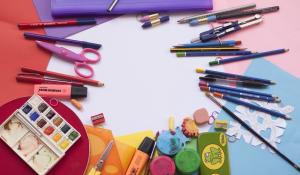 Image: colorful art supplies laid out on table. Topic: Are Your Art Supplies Toxic?