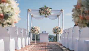 Image: wedding aisle, chairs, and alter. Title: Green Weddings (and More) 