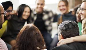 Image: group of diverse people in circle. Topic: 10 Ways to Build Community