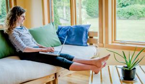 woman sitting on an eco friendly couch