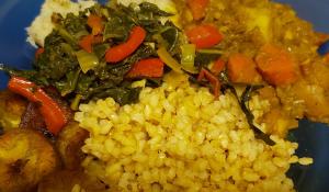 Curry chickpeas, brown rice, collard greens, fried plantains and mashed green banana