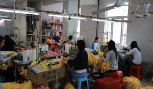 Image: women working in Chinese clothing factory Topic: What You Can Do to End Sweatshops