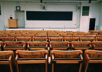 Image: classroom with empty seats. Topic: Greening School Fundraisers