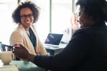 Image: African American women talking Topic: Supporting black-owned business