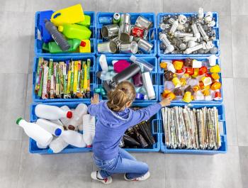 girl recycling