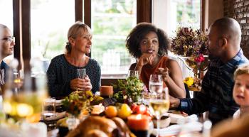 family at thanksgiving table